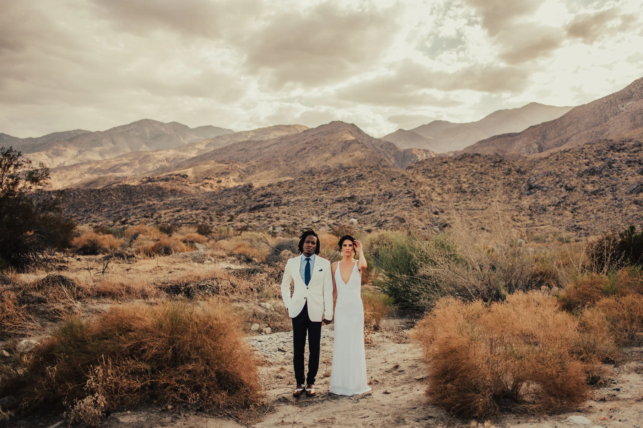 Bride &amp; Groom portraits in the desert after an intimate ceremony photographed by Big Sur Wedding Photographers Tessa Tadlock 