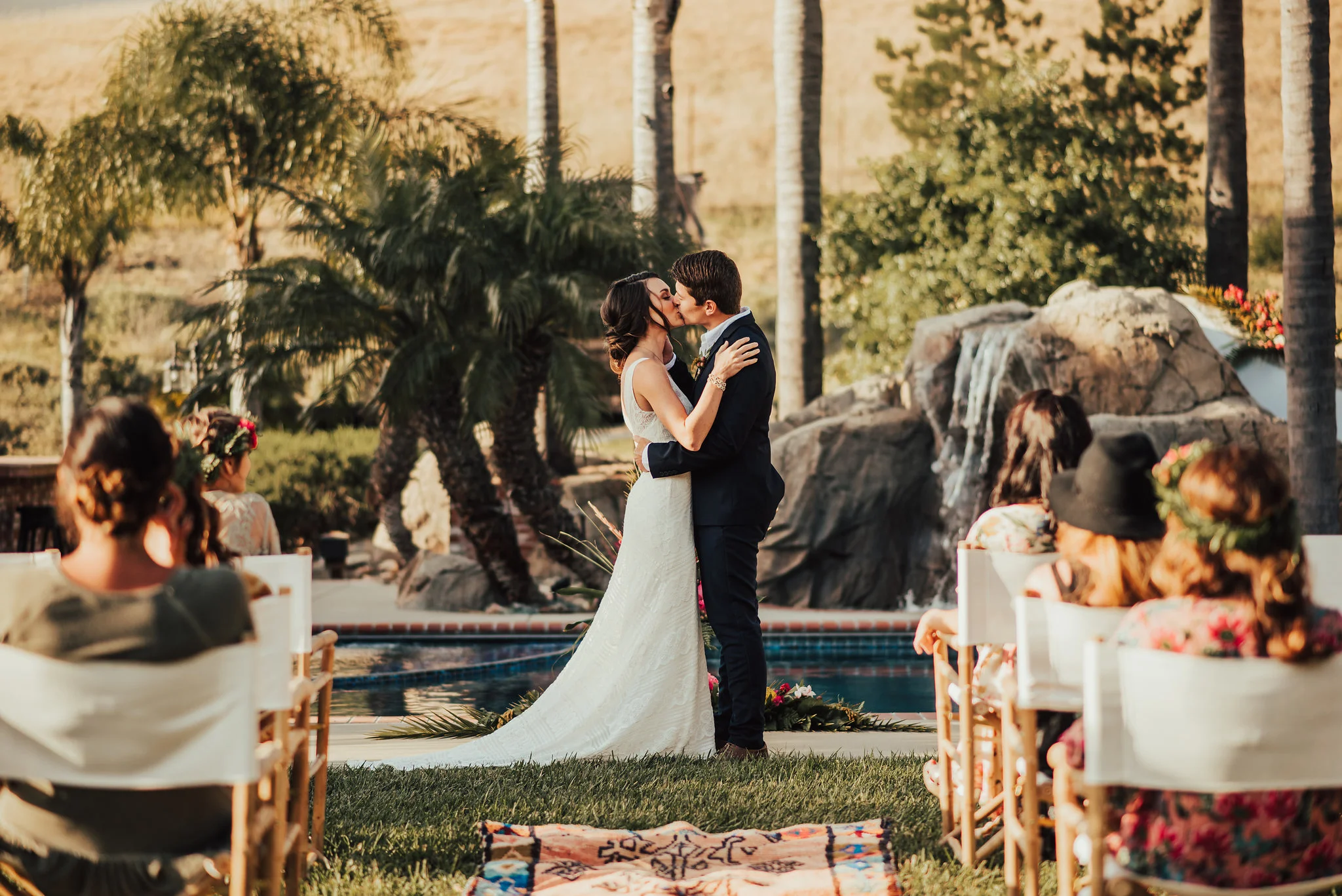 First Kiss as Husband &amp; Wife at Poolside Wedding Photographed by Big Sur Wedding Photographers Tessa Tadlock 