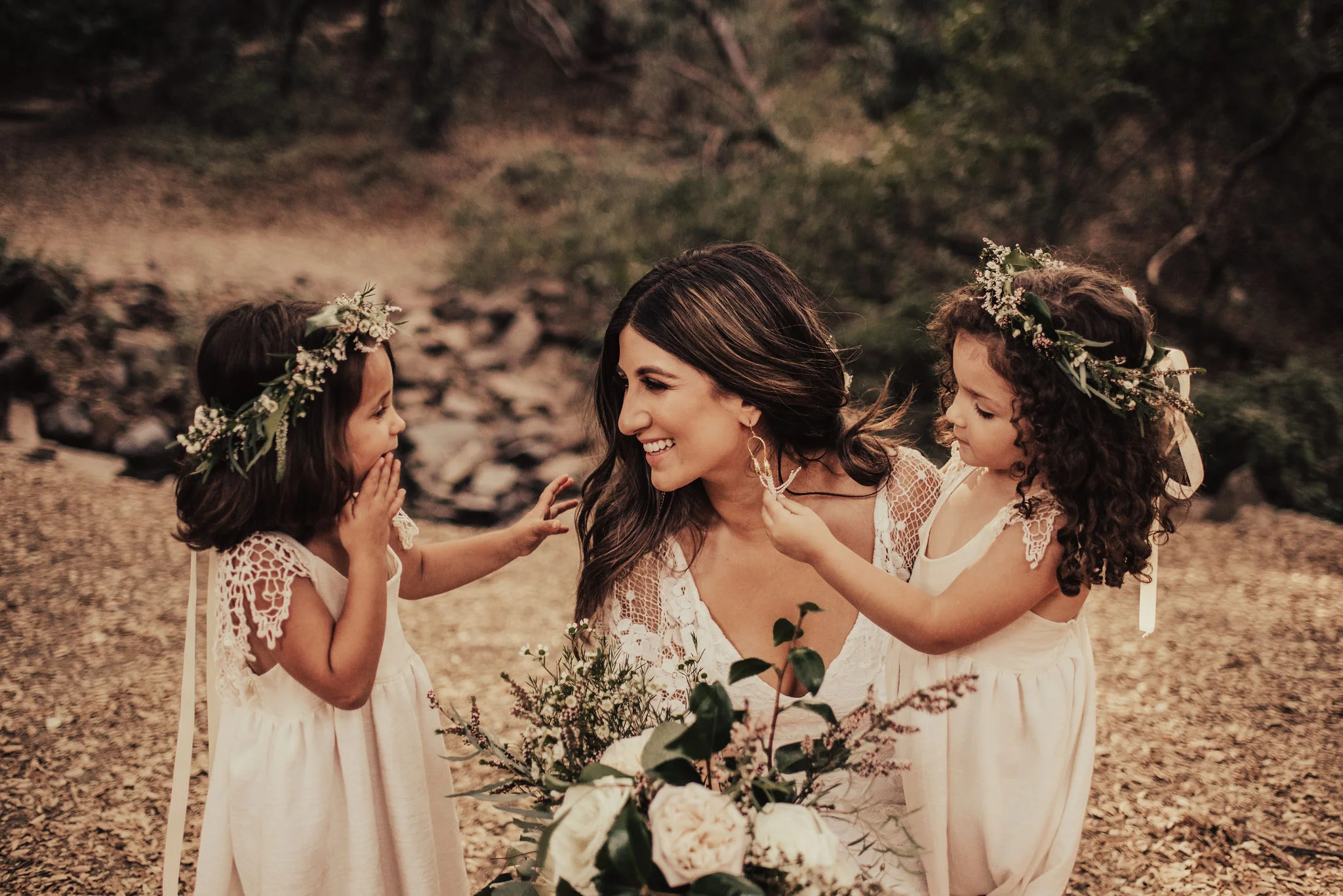 Boho bride and sweet flower girls portrait photographed by Big Sur Wedding Photographers Tessa Tadlock 