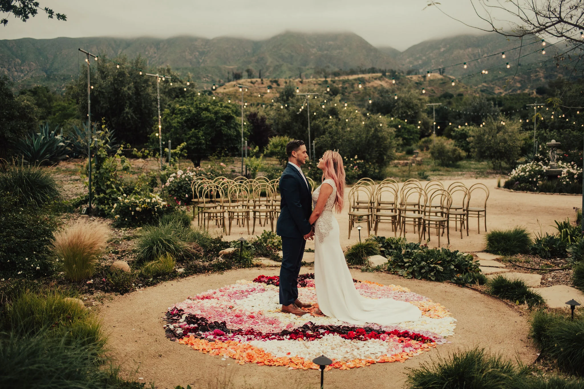 Boho Ojai Elopement Ceremony Setup with Floral Petal Circle and Greenery Photographed by Big Sur Wedding Photographers Tessa Tadlock