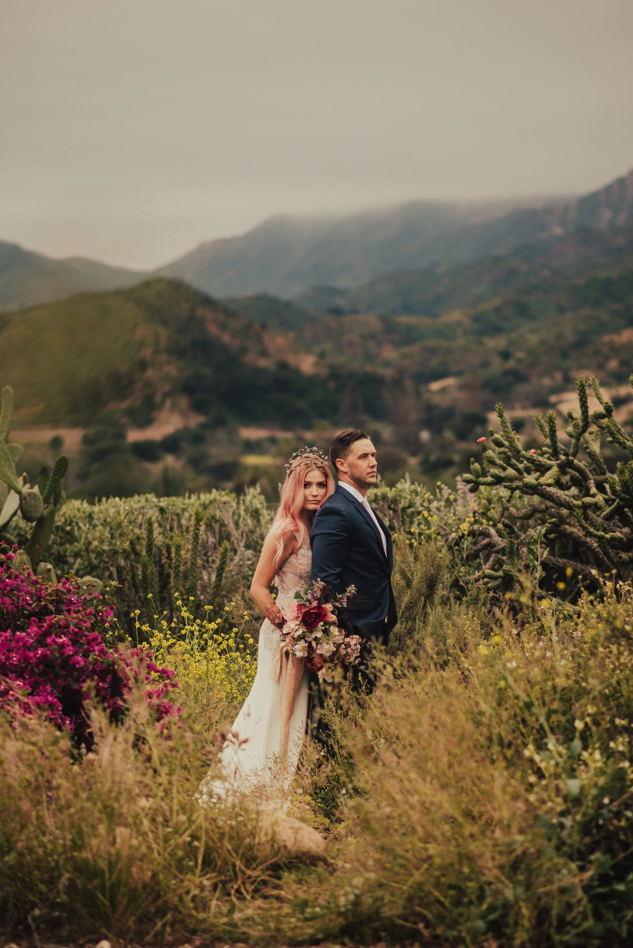 Bride &amp; Groom Stand in Ojai Field of Wildflowers Photographed by Big Sur Wedding Photographers Tessa Tadlock
