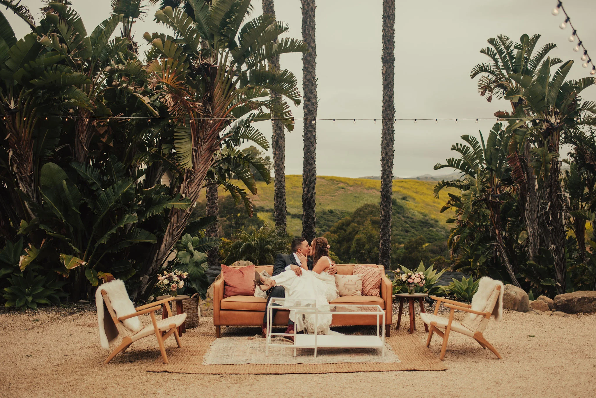 Cutest Santa Barbara Wedding Reception Lounge Setup with Palm Trees Photographed by Big Sur Wedding Photographers Tessa Tadlock