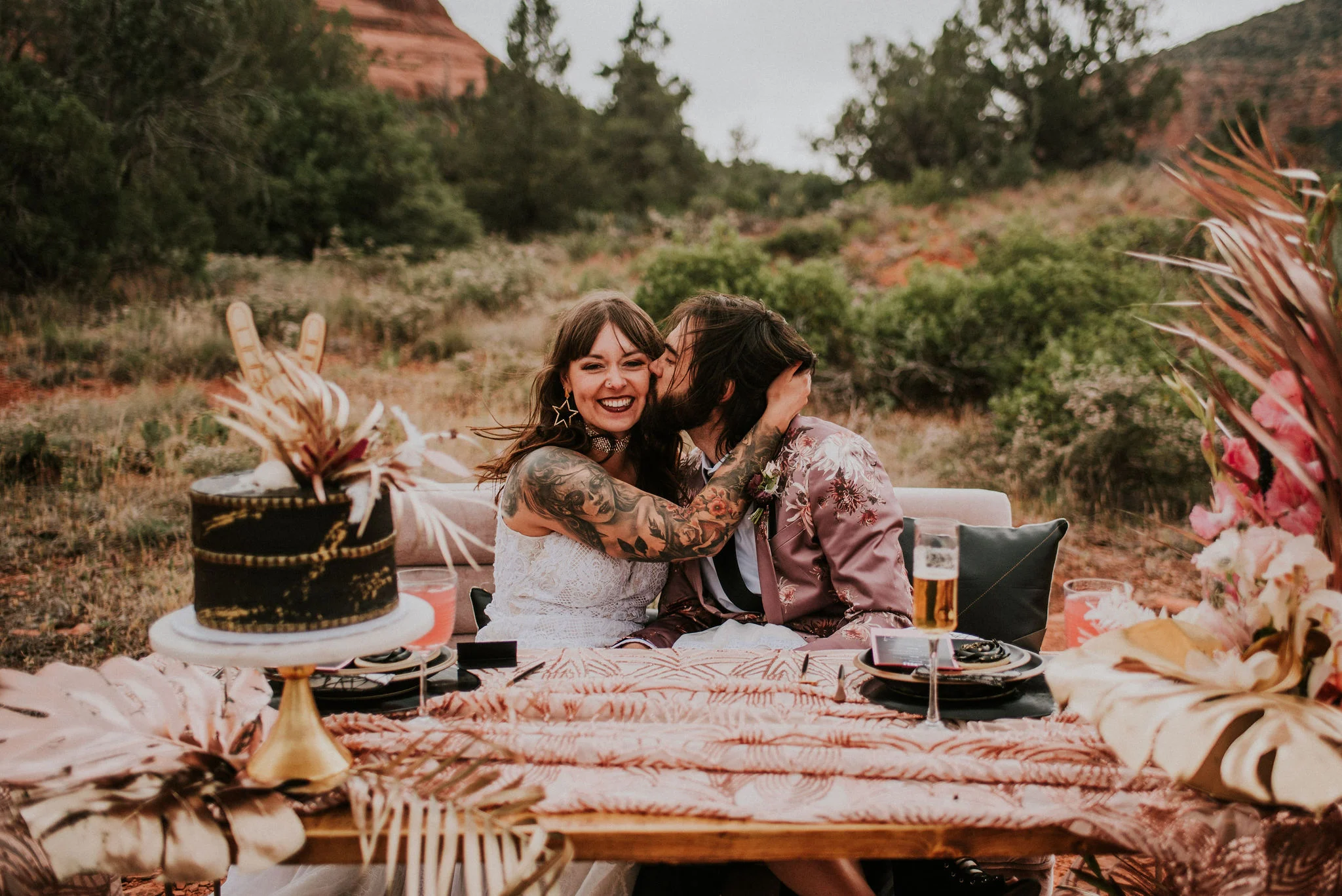 Boho Sweetheart Table with Rock &amp; Roll Wedding Cake and Tattooed Couple Photographed by Big Sur Wedding Photographers Tessa Tadlock