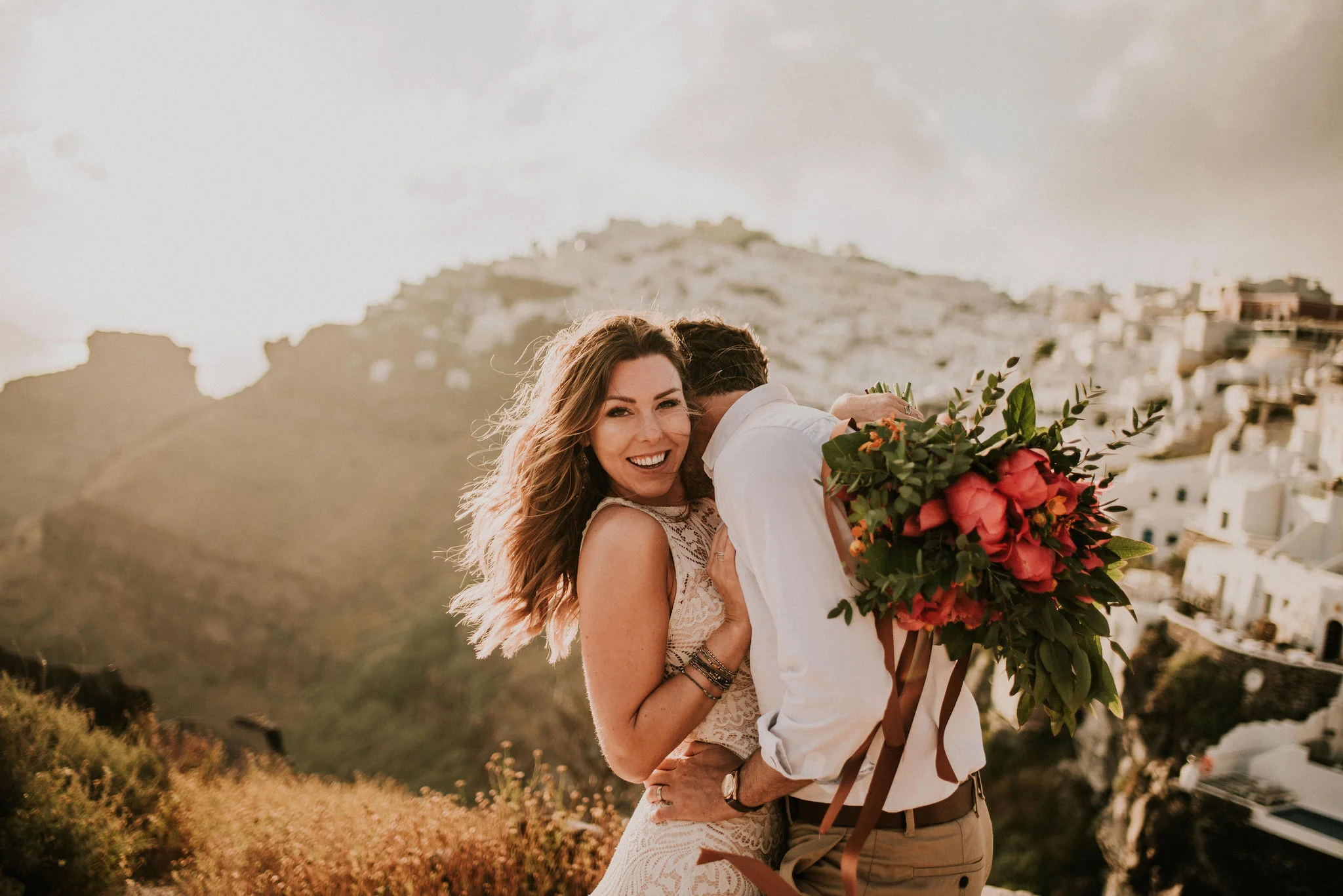 Smiling Bride Portraits on Greece Island photographed by Big Sur wedding photographers Tessa Tadlock