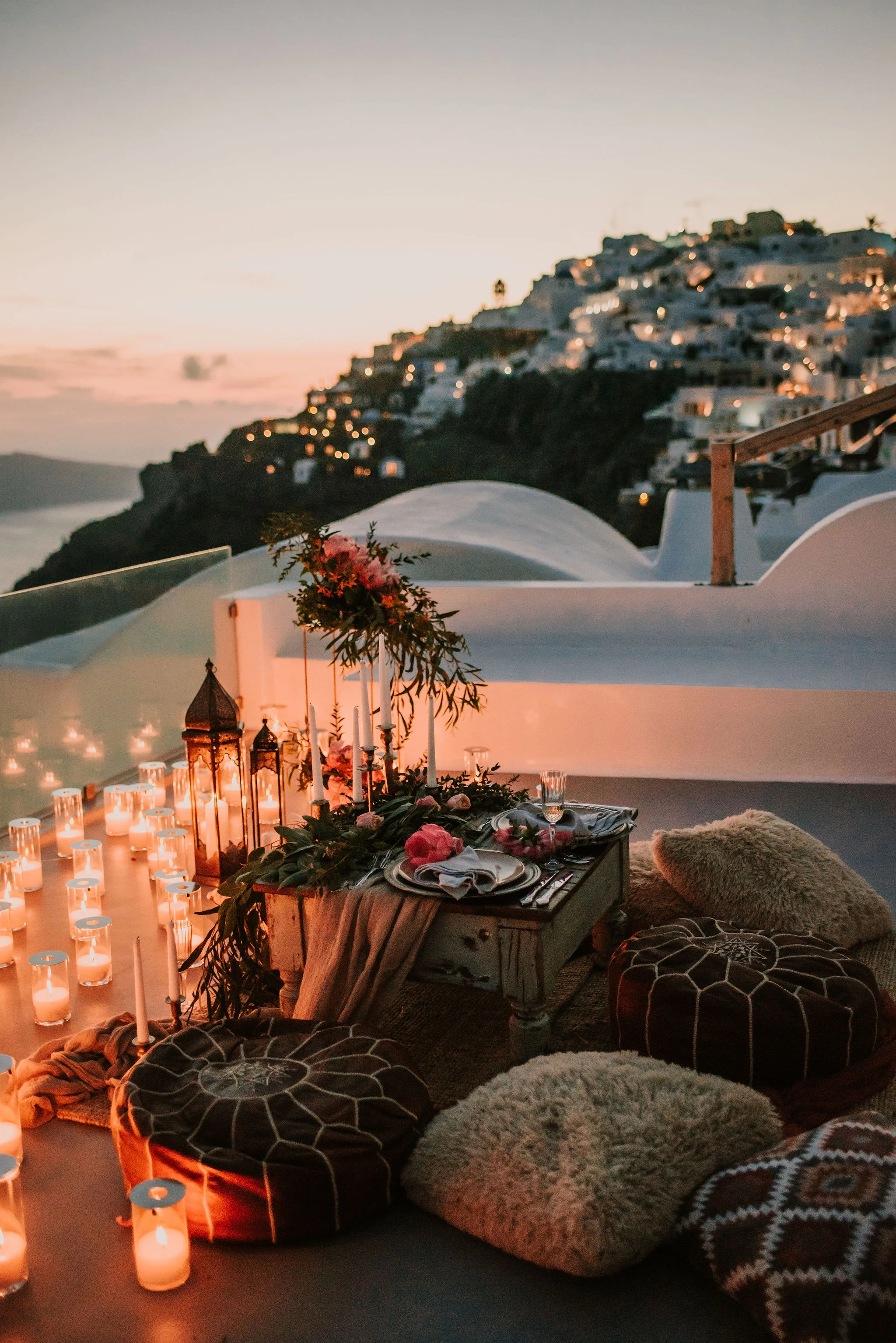 Boho Elopement Dinner with Throw Pillows and Candles photographed by Big Sur wedding photographers Tessa Tadlock