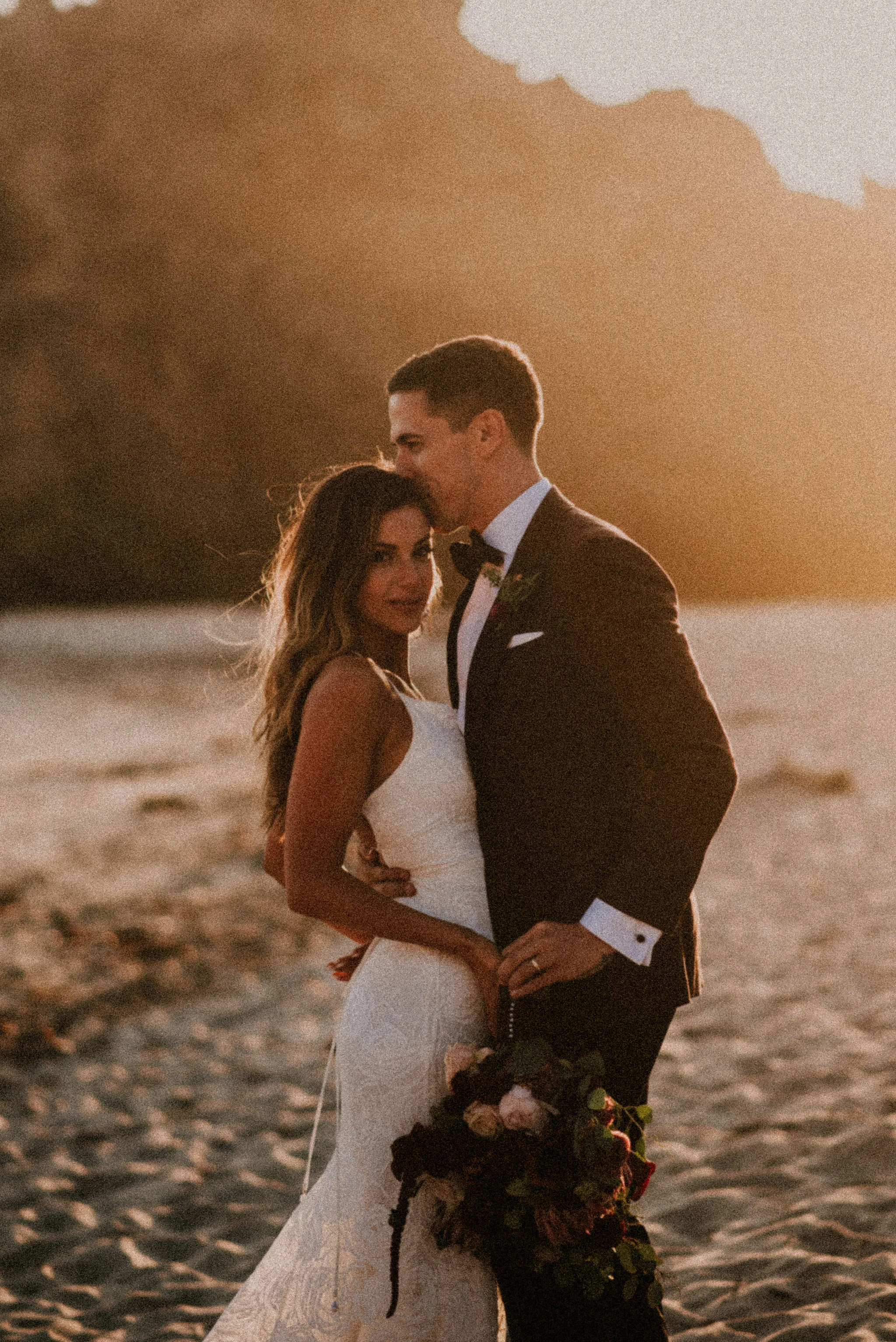 Dreamy Couple Portraits on Big Sur Beach photographed by Big Sur wedding photographers Tessa Tadlock