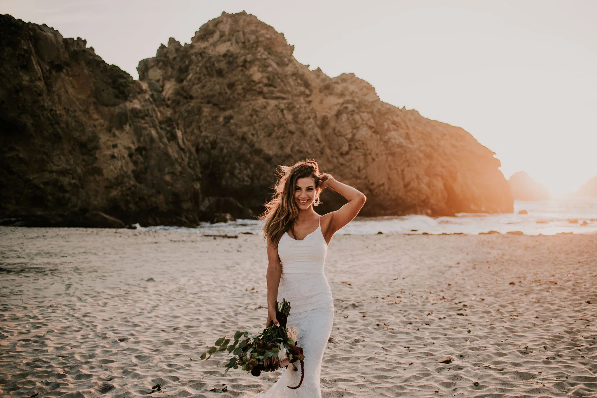 Boho Bridal Portraits on Big Sur Beach photographed by Big Sur wedding photographers Tessa Tadlock