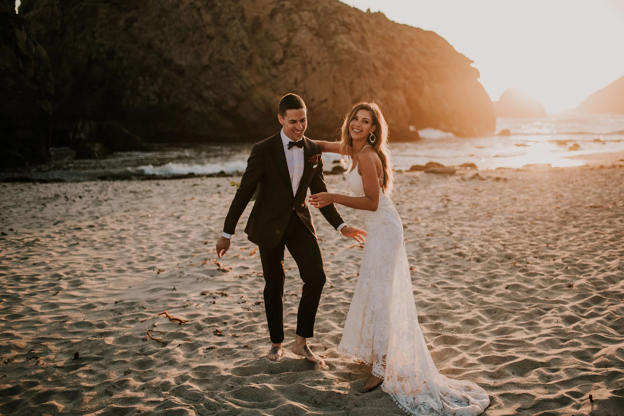 Candid Bride &amp; Groom Portraits on the Beach photographed by Big Sur wedding photographers Tessa Tadlock