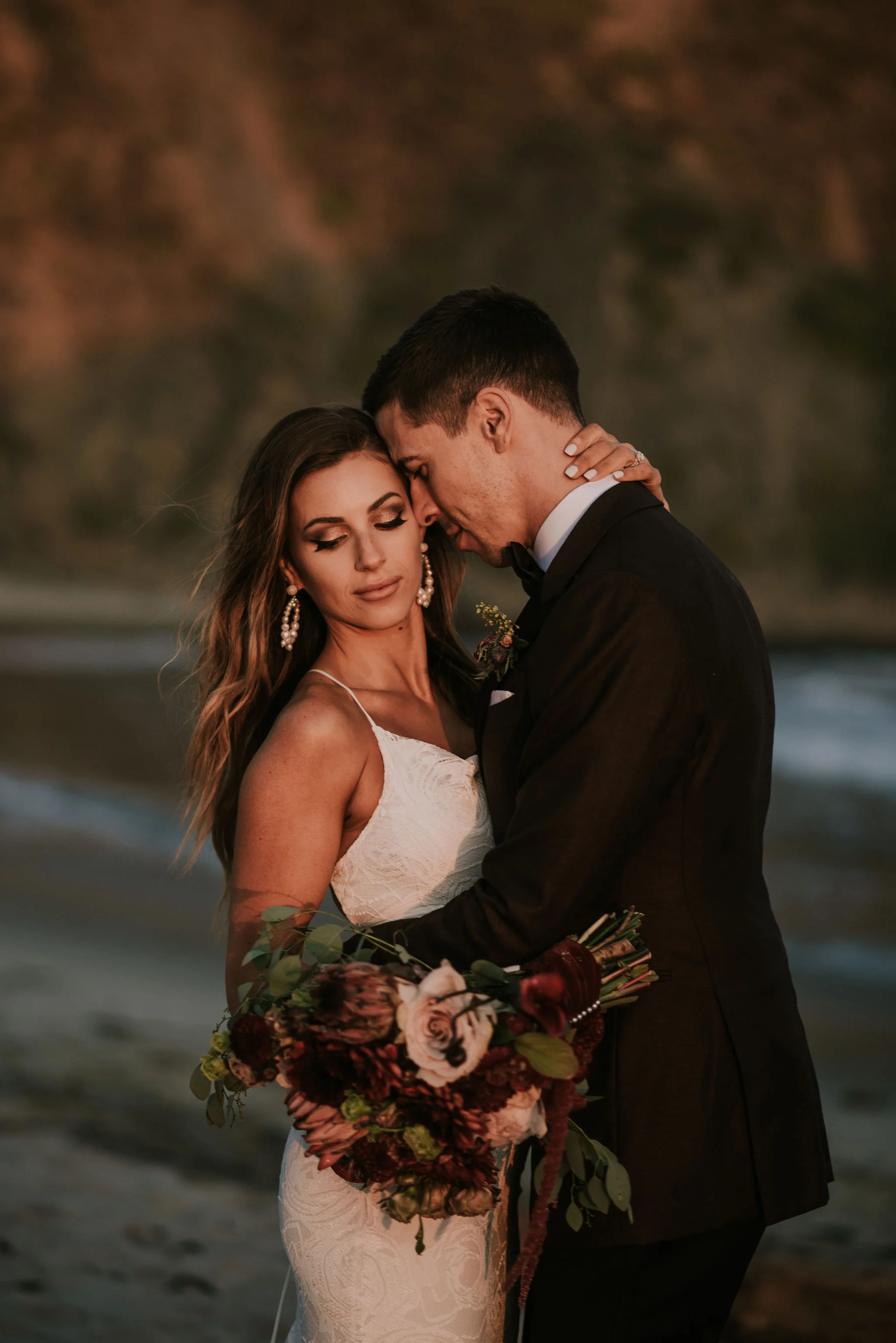 Romantic Bride &amp; Groom Portraits on the Beach photographed by Big Sur wedding photographers Tessa Tadlock
