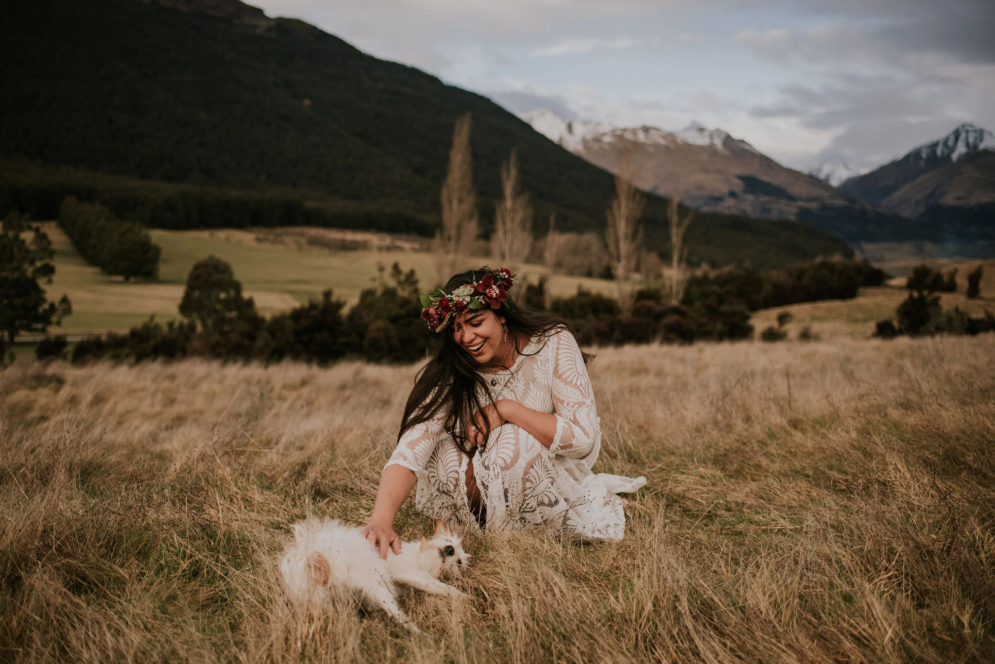 New Zealand Bride in Flower Crown with Puppy photographed by Big Sur wedding photographers Tessa Tadlock