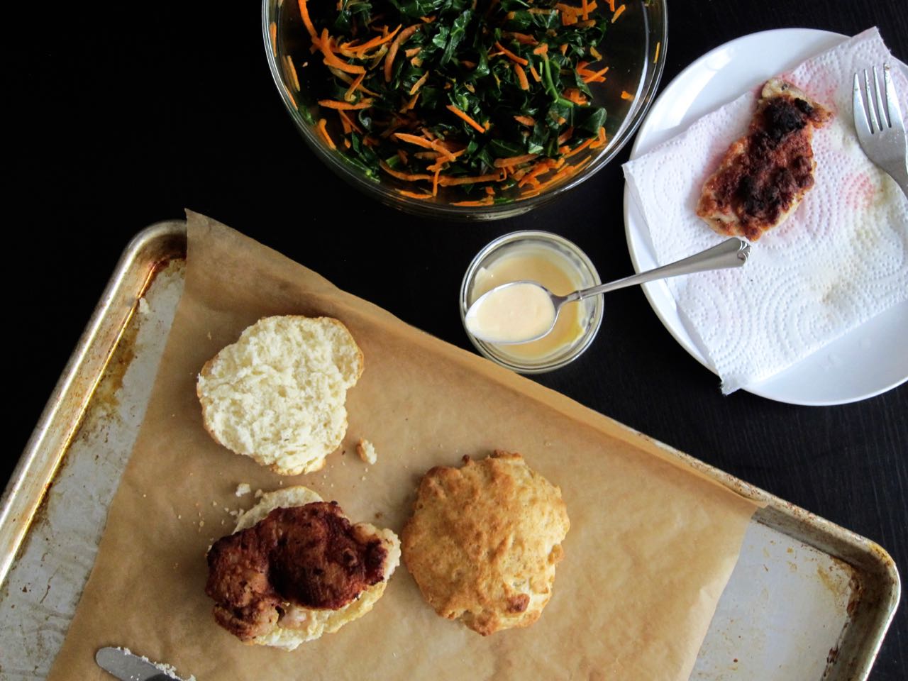 Building a fried chicken biscuit sandwich