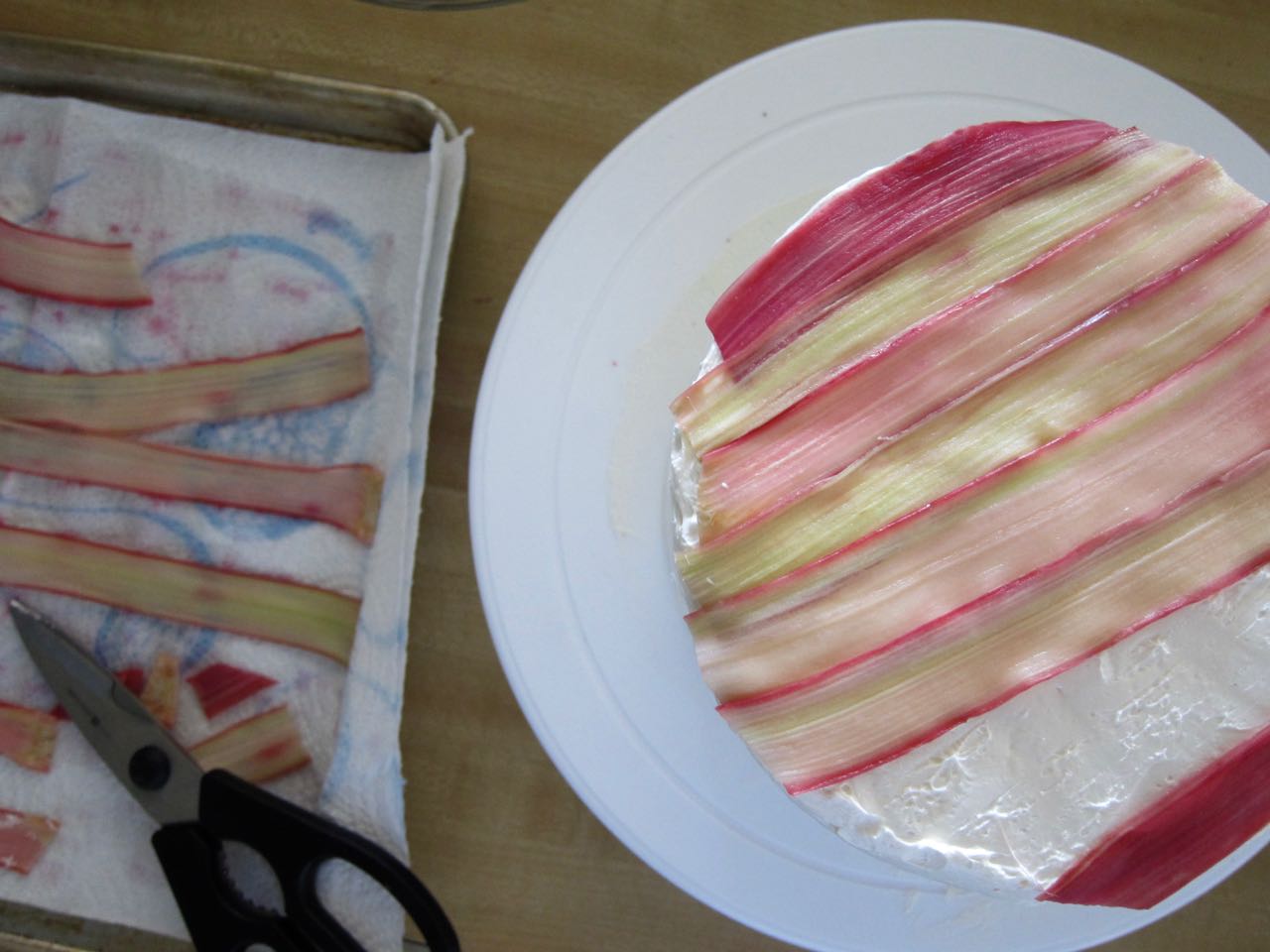 decorating cake with rhubarb strips.jpg