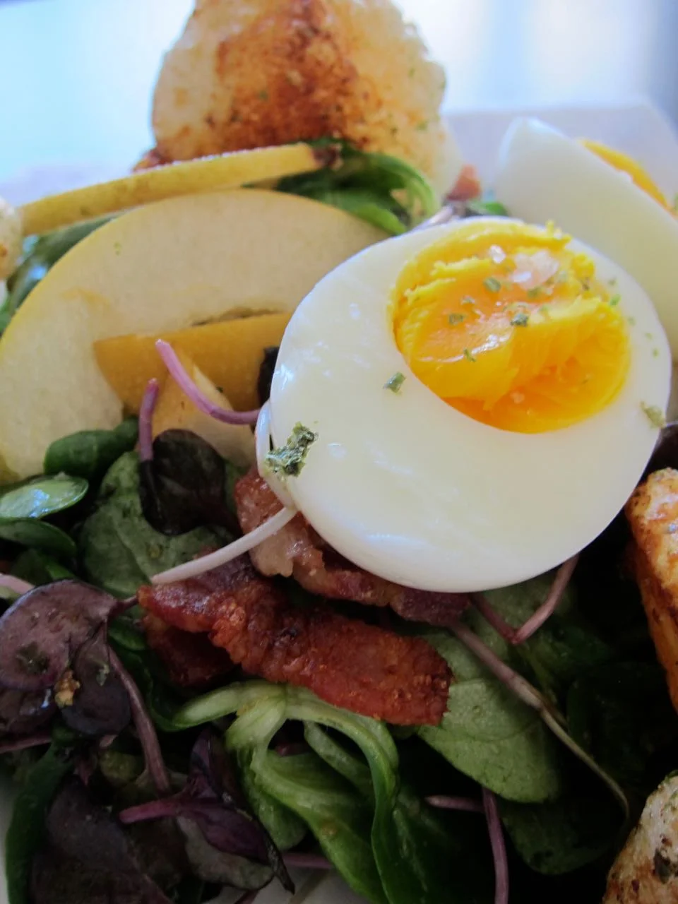 Mochi Crouton Salad topped with an egg