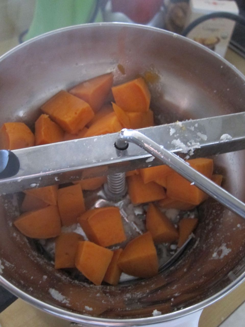 mashing sweet potatoes.jpg