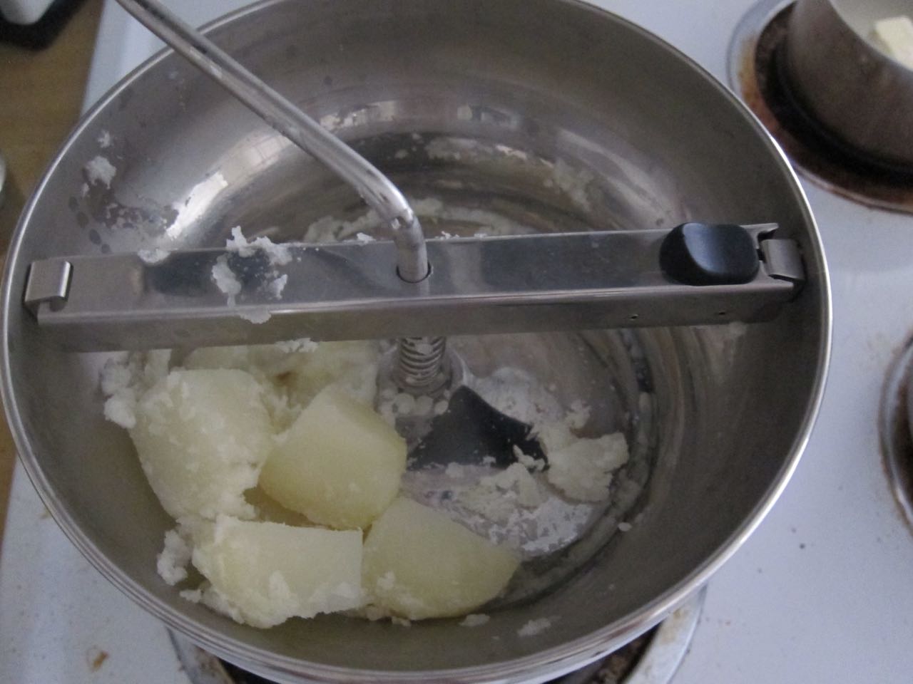 mashing white potatoes.jpg