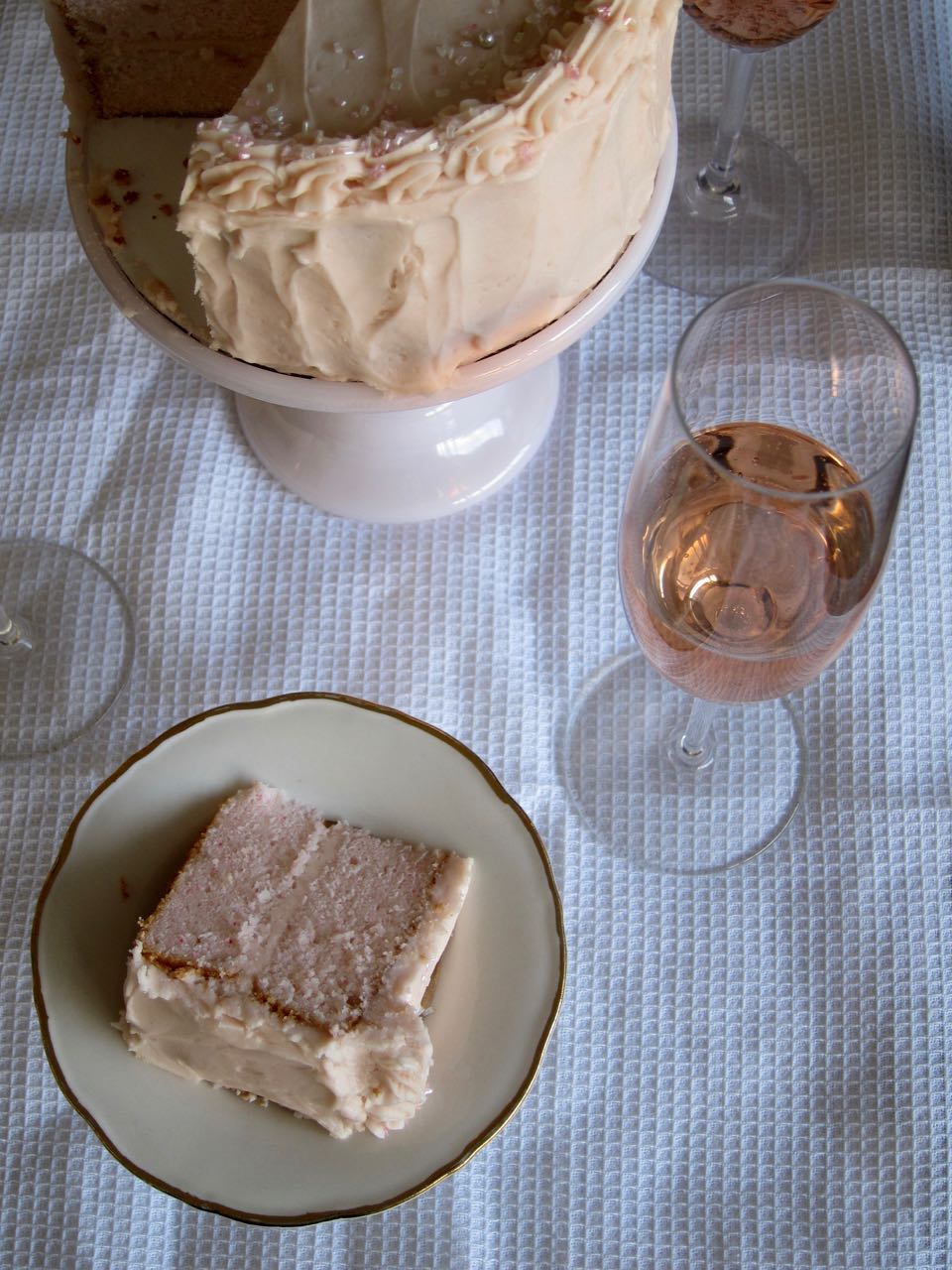 sliced pink champagne cake and pink champagne.jpg