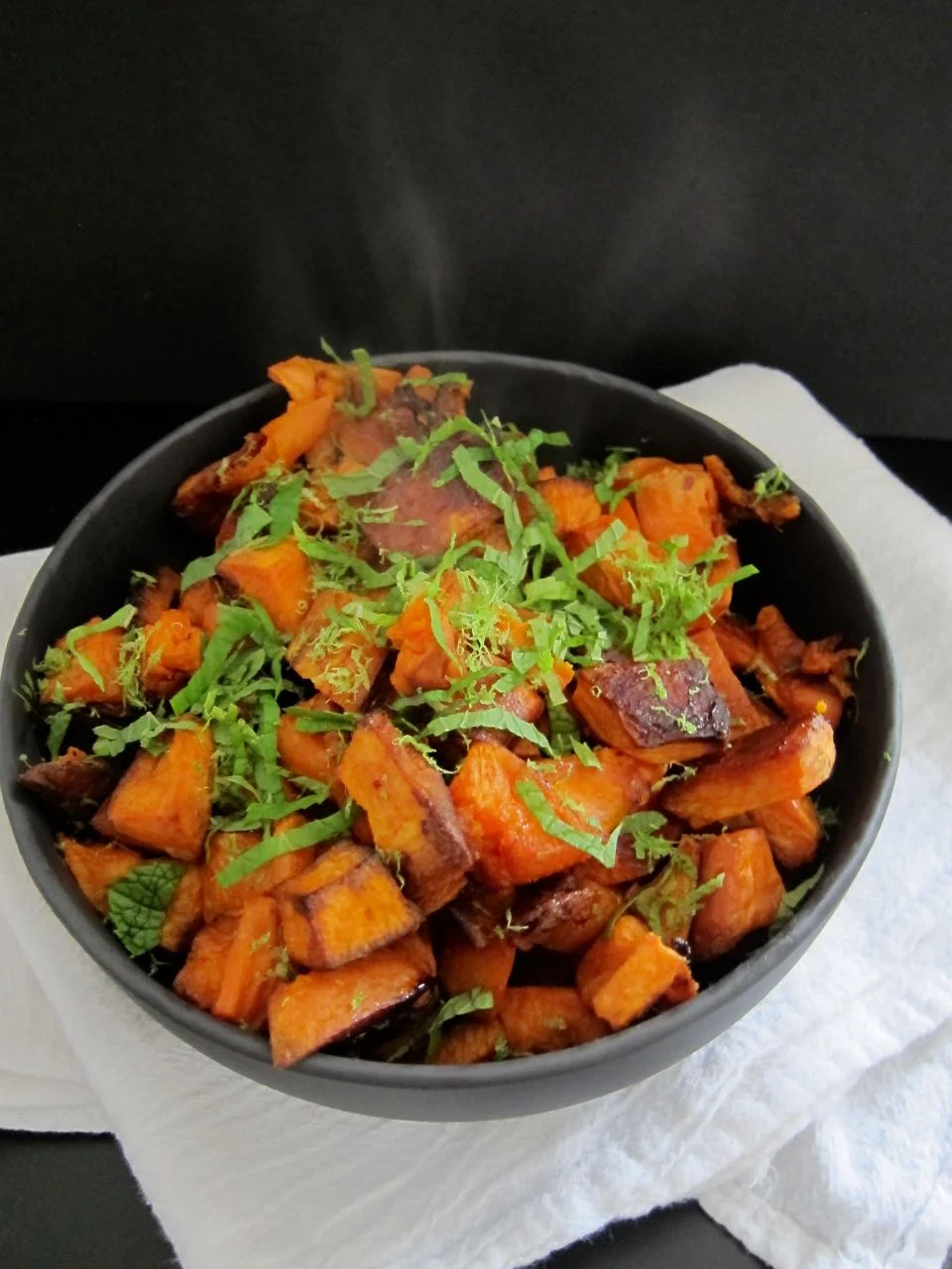 coconut roasted sweet potatoes with lime and mint