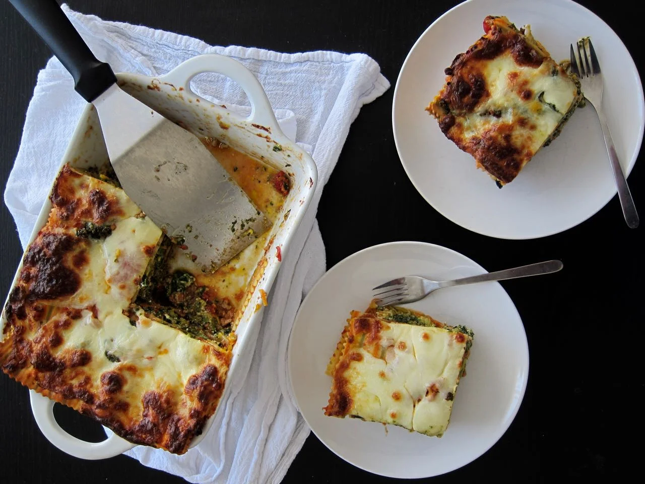serving veggie & chicken lasagna