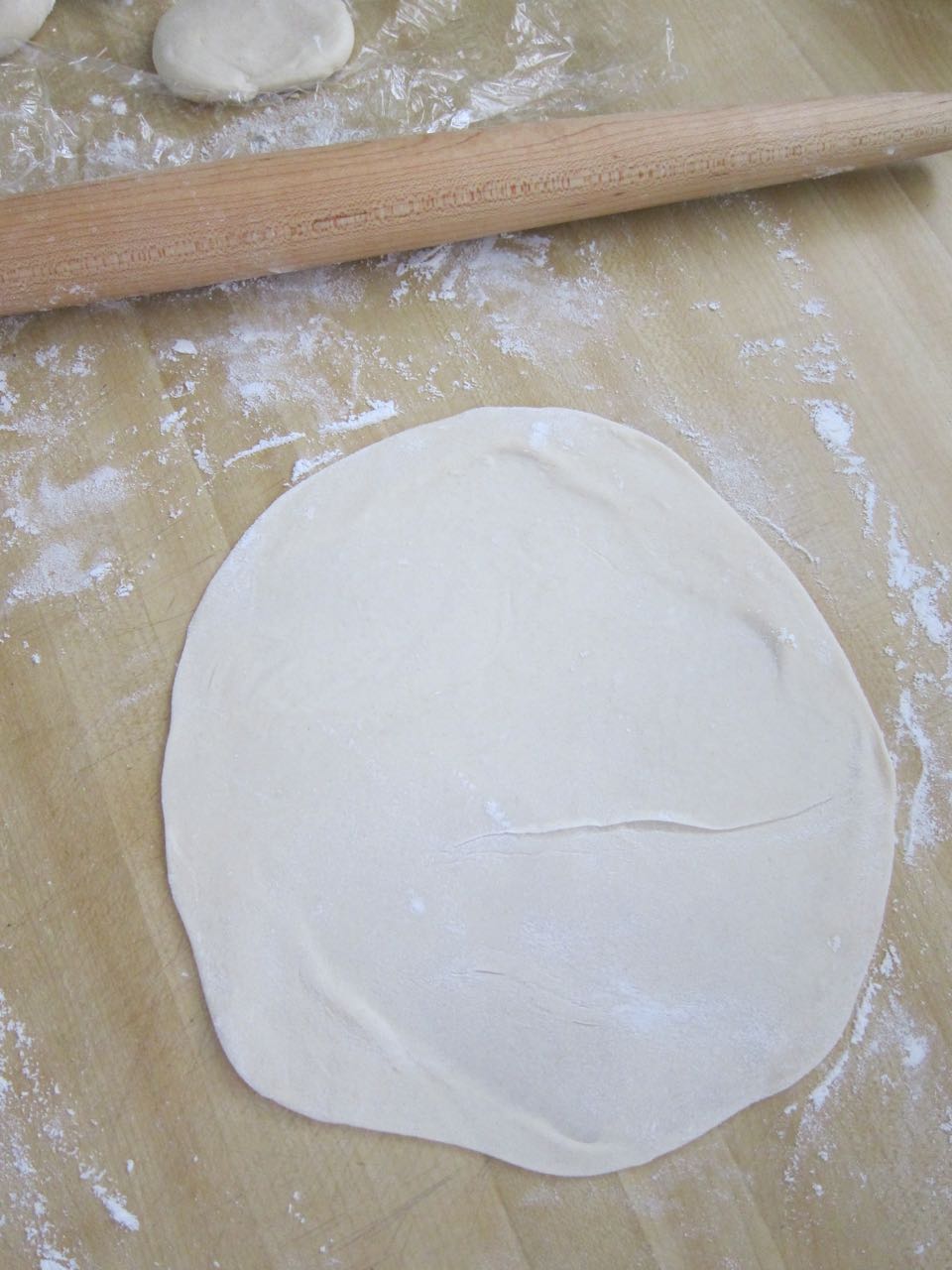 rolling flour tortillas.jpg
