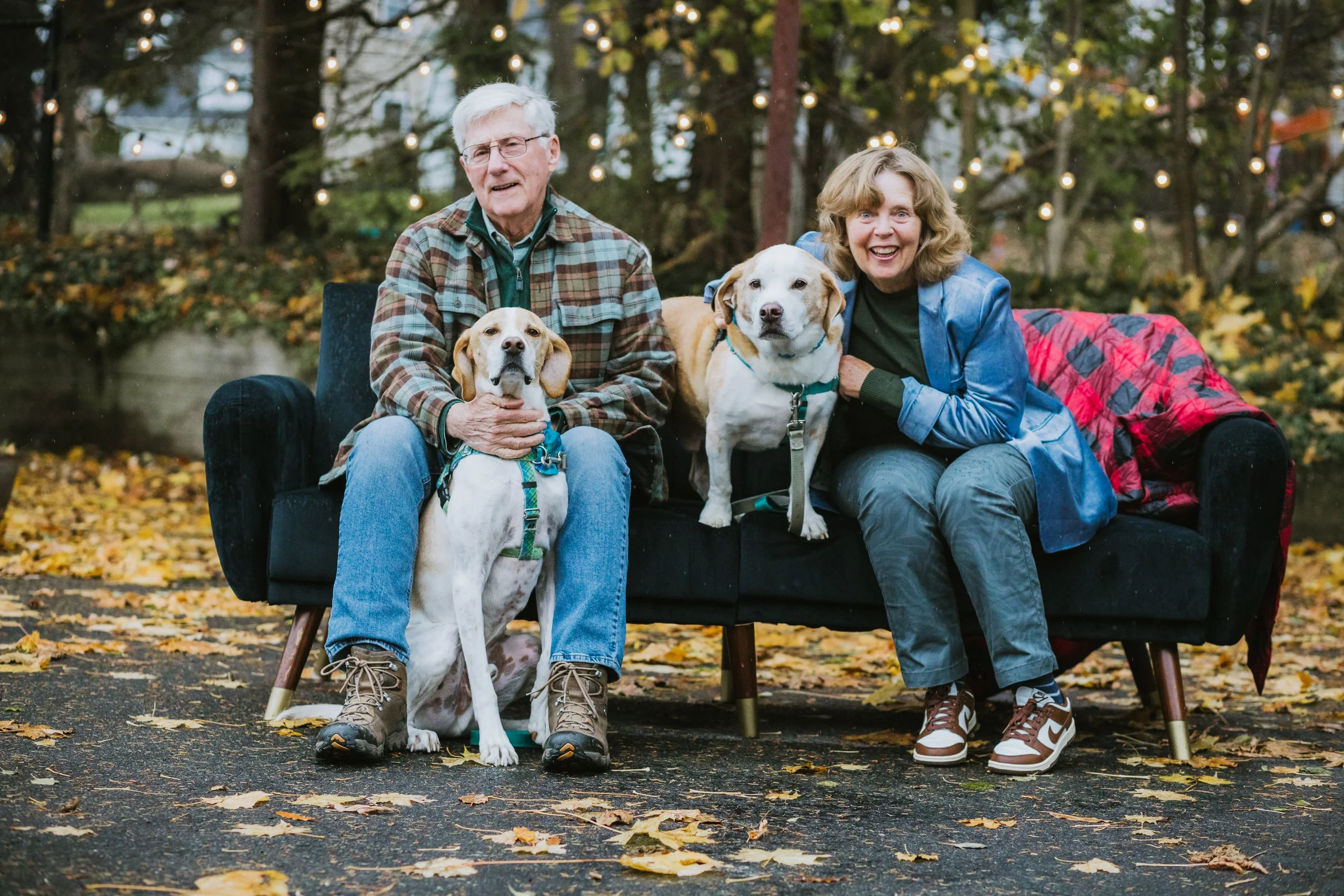 Judy and John Winslow relaxing at home in Central New York with their granddogs.