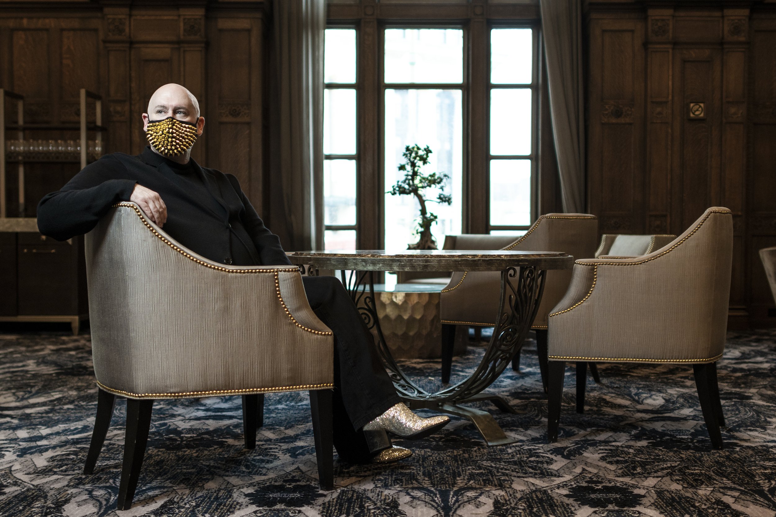  James Jefferson from local creative marketing agency Blackbook Lifestyle is photographed at Chateau Laurier wearing the mask he designed. 