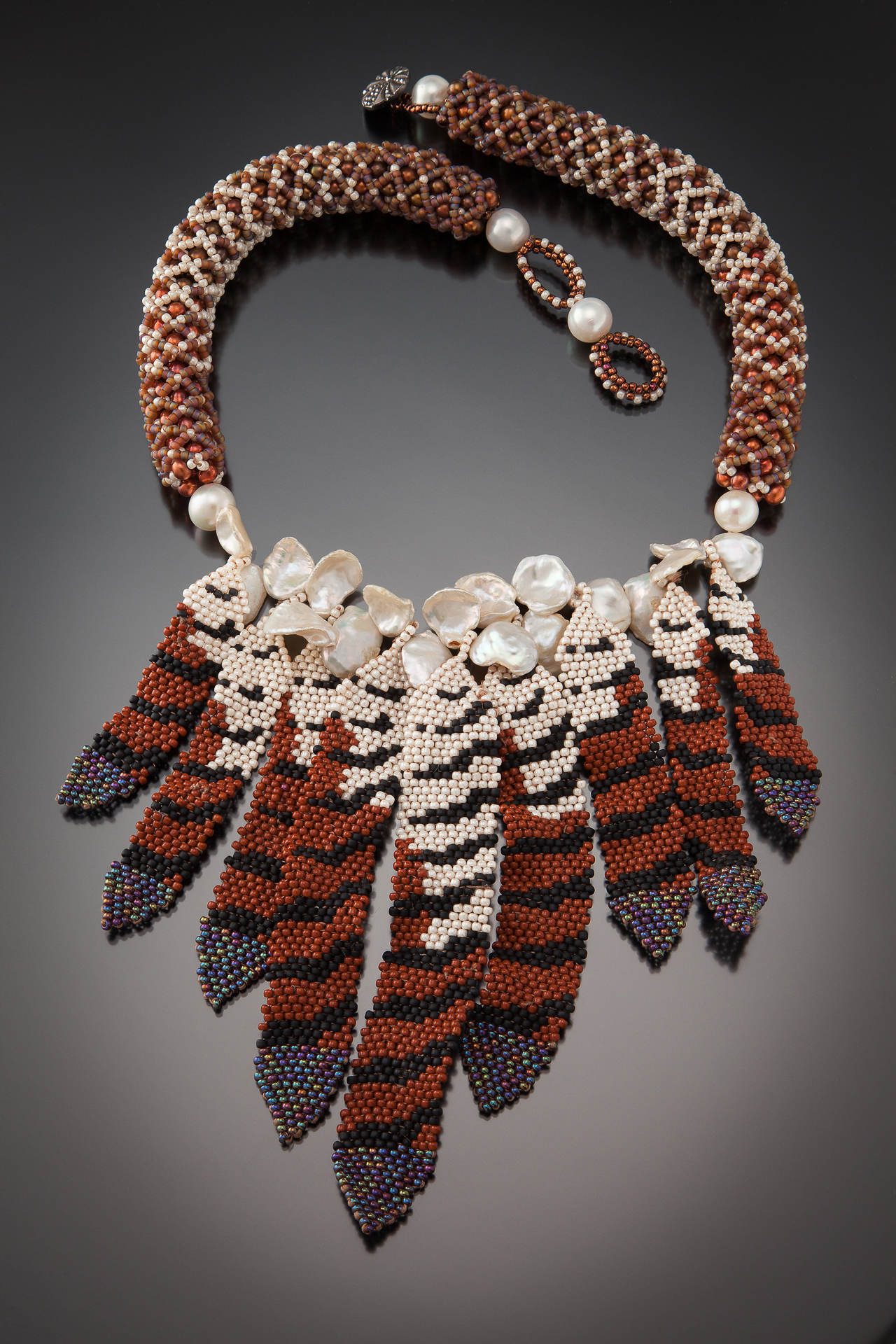 3-karin-alisa-houben-hawk-feather-necklace.jpg