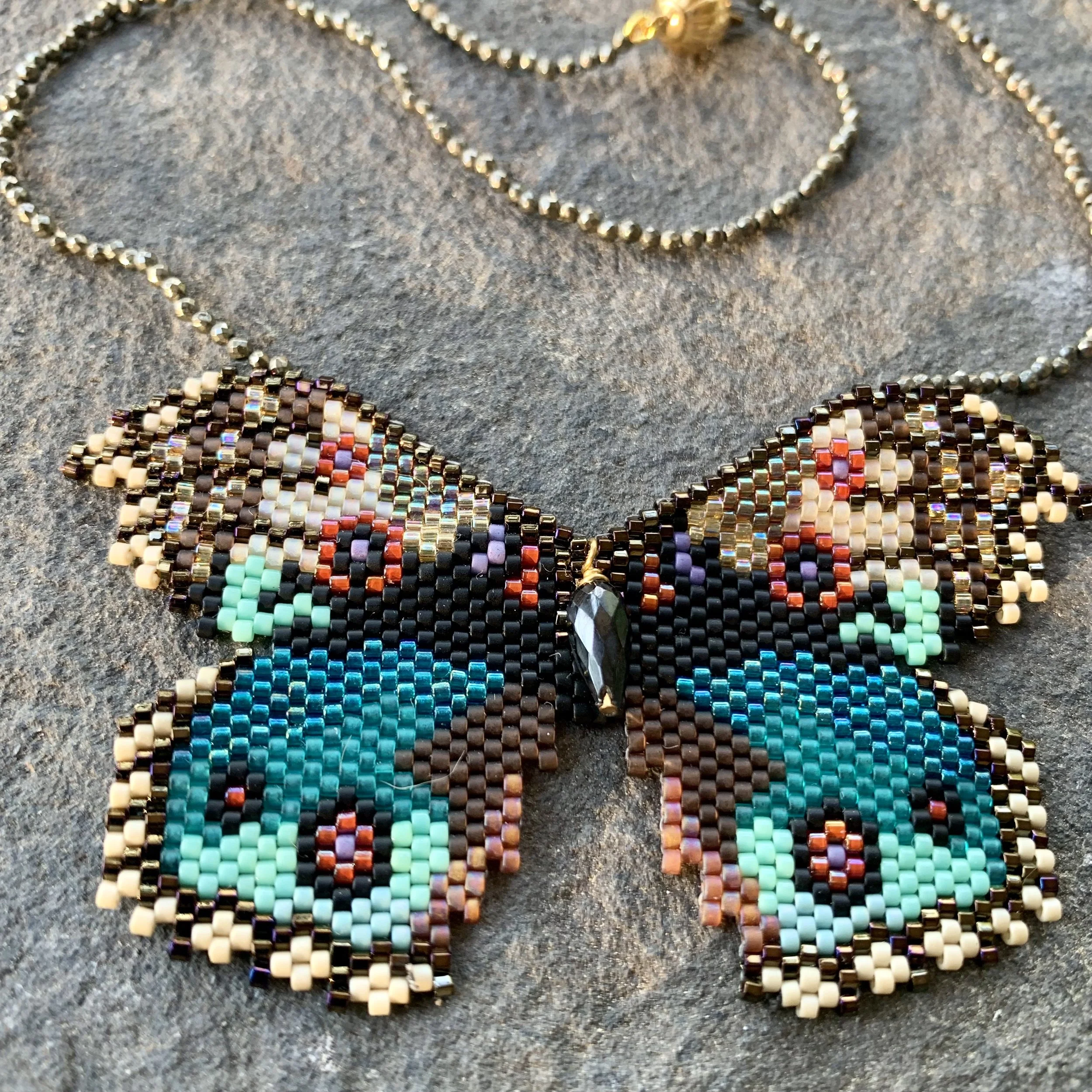 karin-alisa-houben-blue-pansy-butterfly-pyrite-1.jpeg