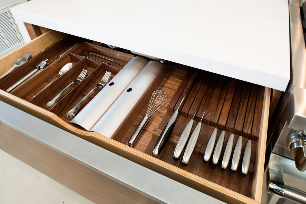 Custom Silverware Drawer with easy access built-ins for foil and plastic wrap storage.
