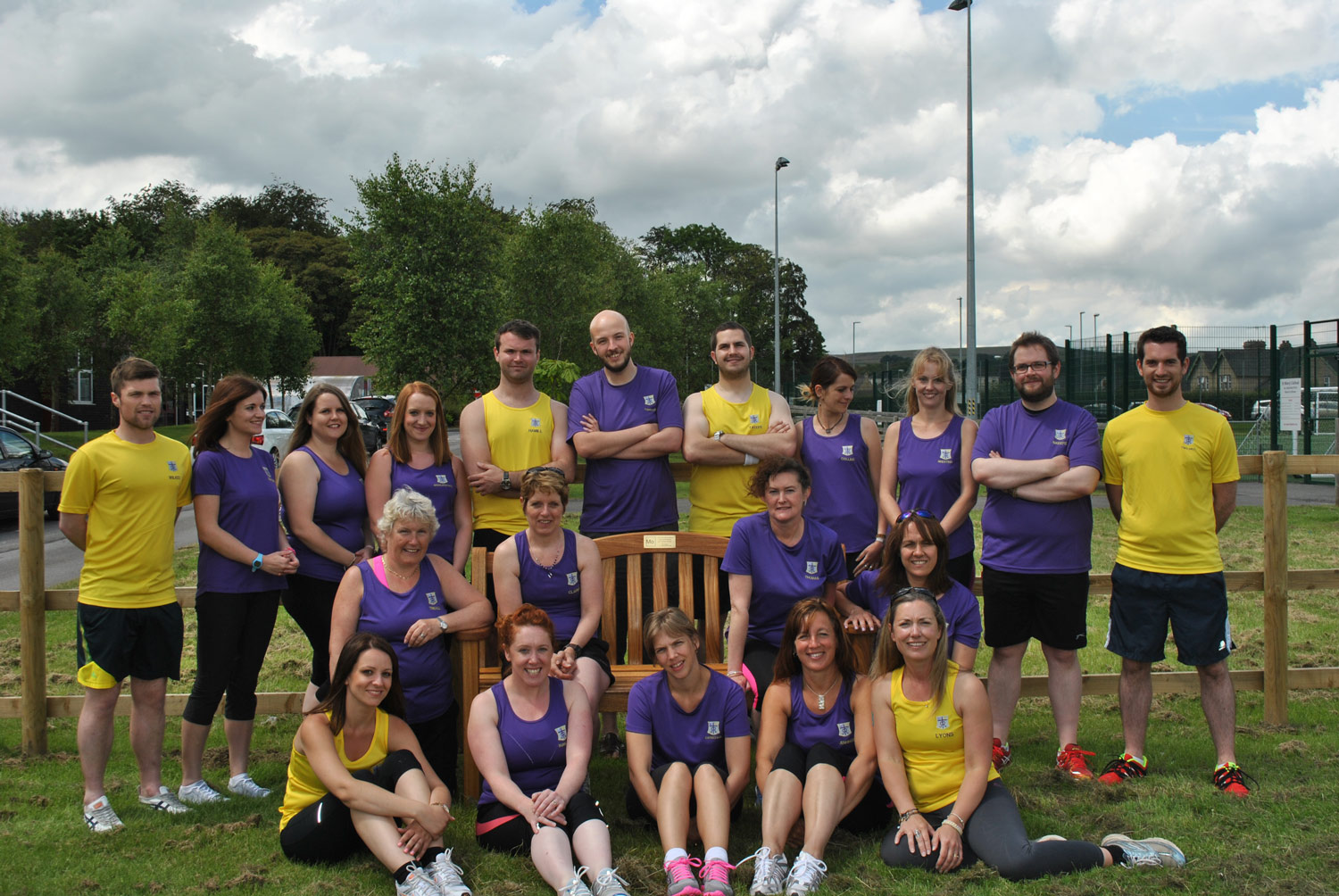 Photo: St. Mary's staff take a commemorative photo in our Memorial Garden