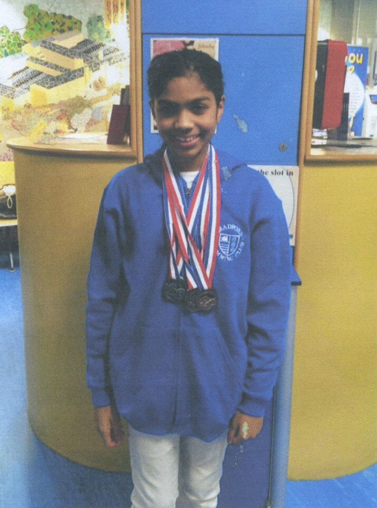 Photo: Julia with her collection of medals from the event