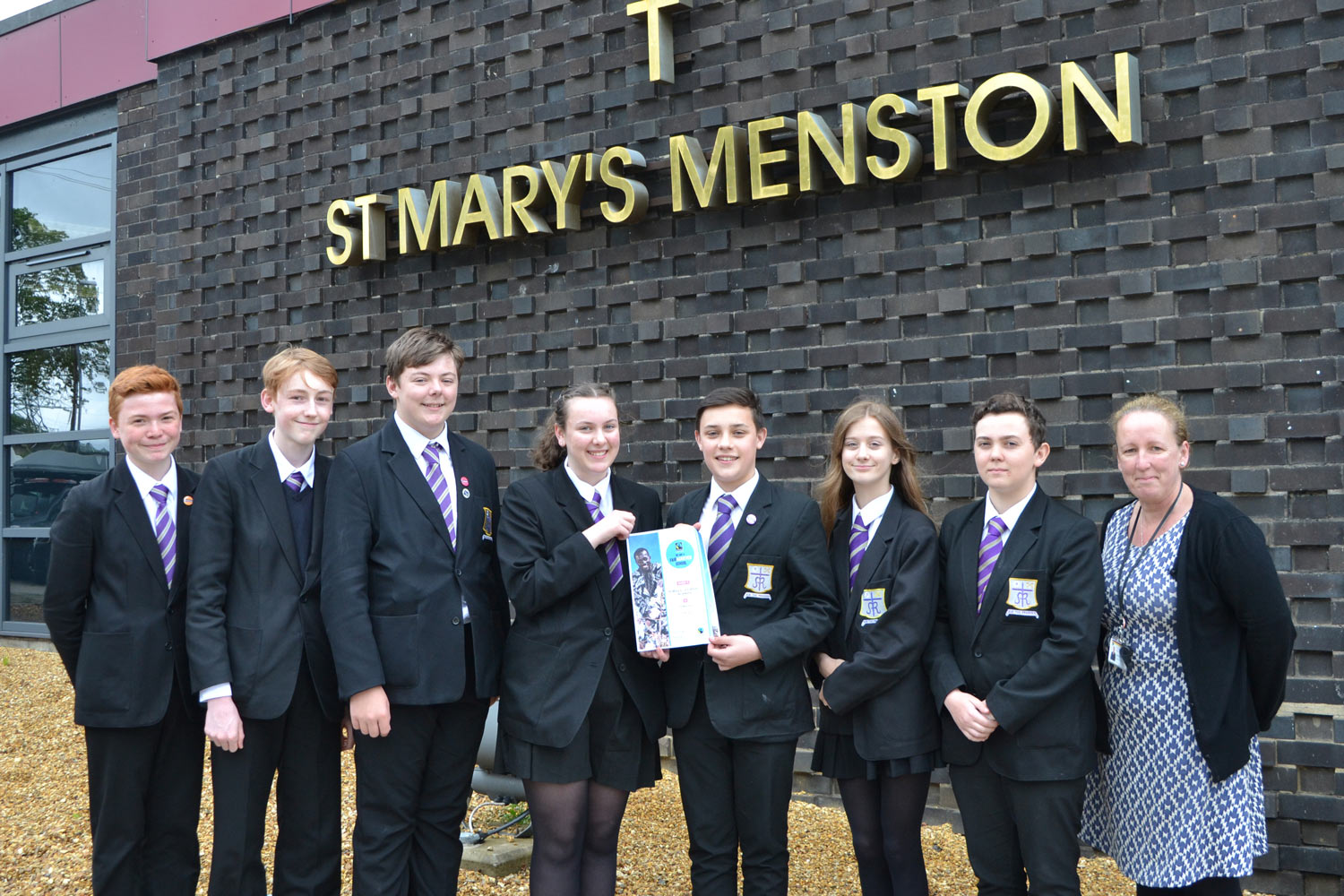 Photograph (Left to Right): Aidan Silcock, Jack Smith-Eccles, Tom Allan, May Gavin, Sam Clifford-Hassan, Alessandra Orlandini, Ethan Walker, Mrs Hayes (Global Learning Coordinator)
