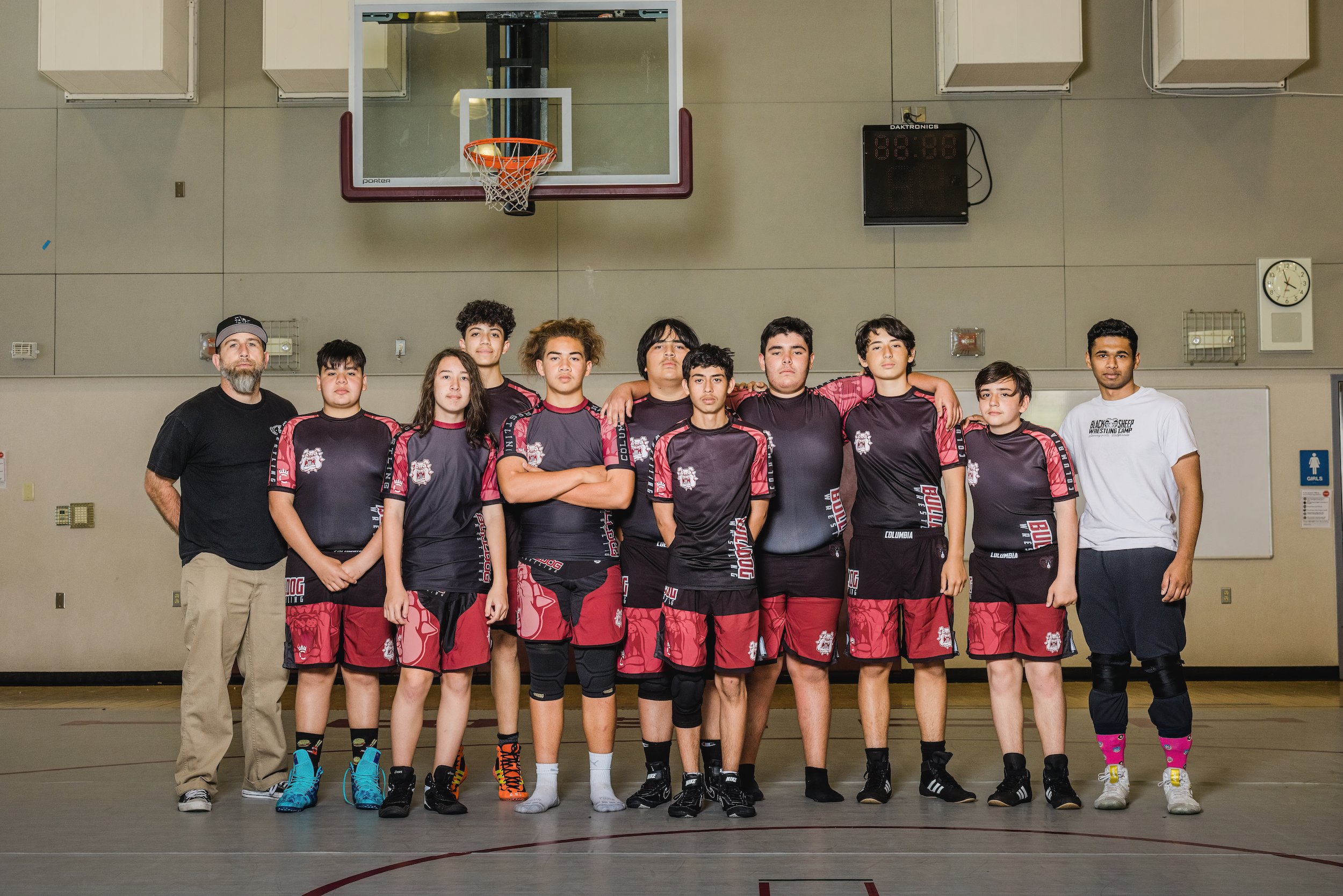 2021-2022 CMS 8th Grade Boys Wrestlers with the Coaching Staff