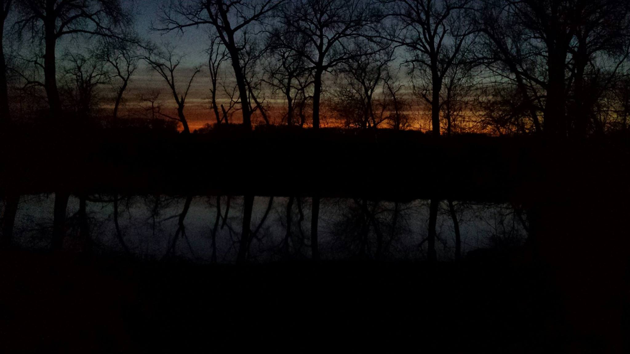 Sunset at our pond near the Family Camping Area