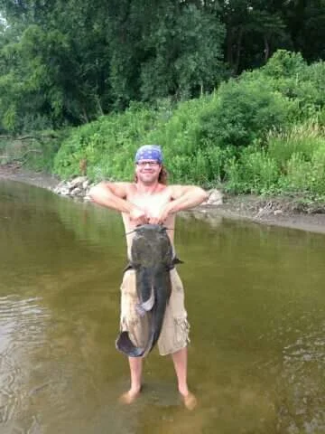 Brock showing off his big one that he pulled out of the river along the float.