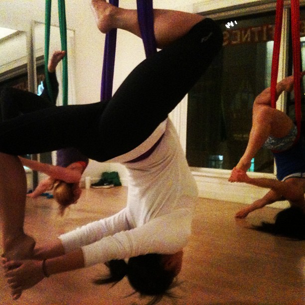 Inverted Pigeon in Aerial Yoga