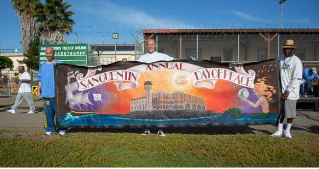 2018 Day of Peace banner painted by participants in the Arts in Corrections program