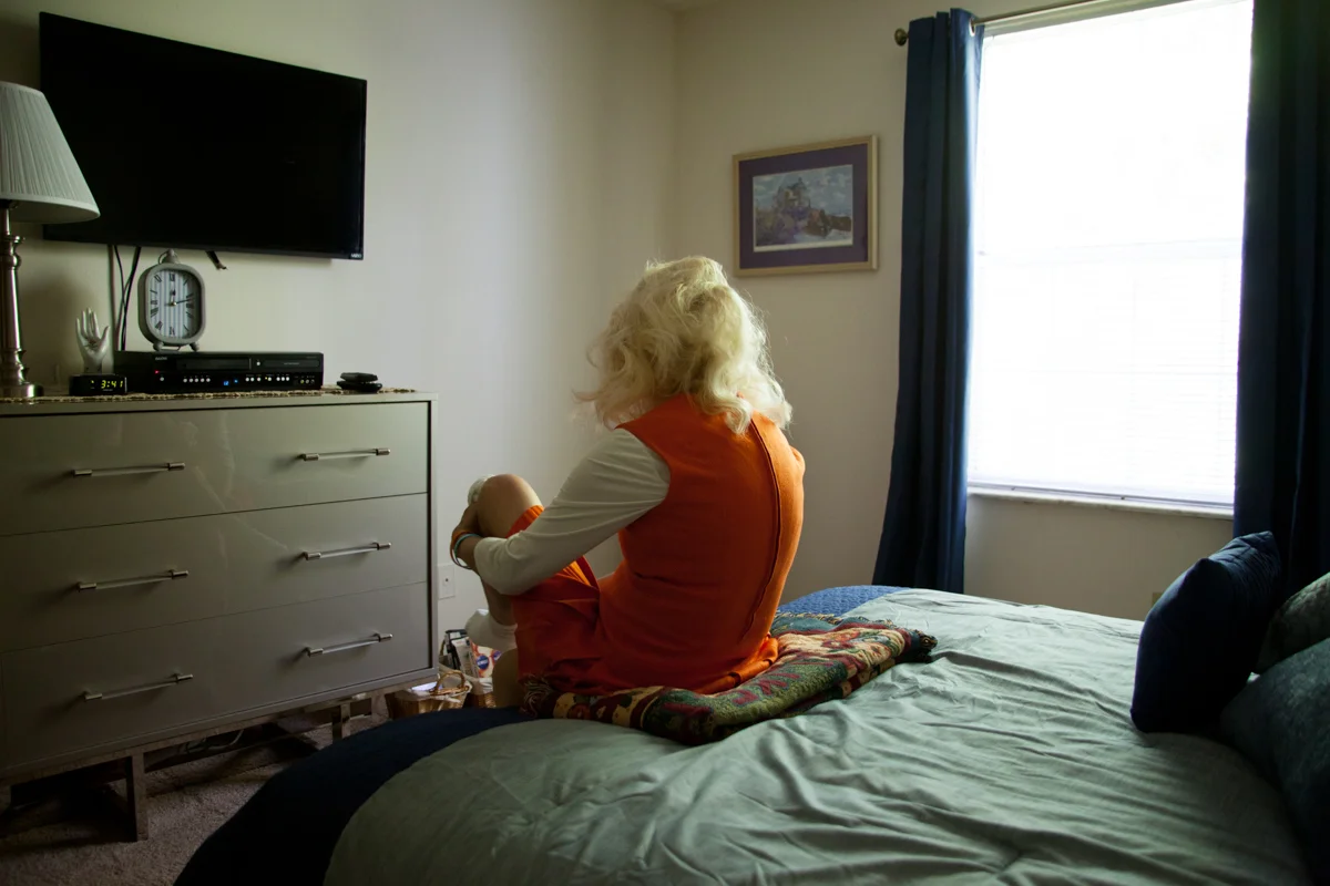 Mom changing into her high school cheerleading uniform , 2018