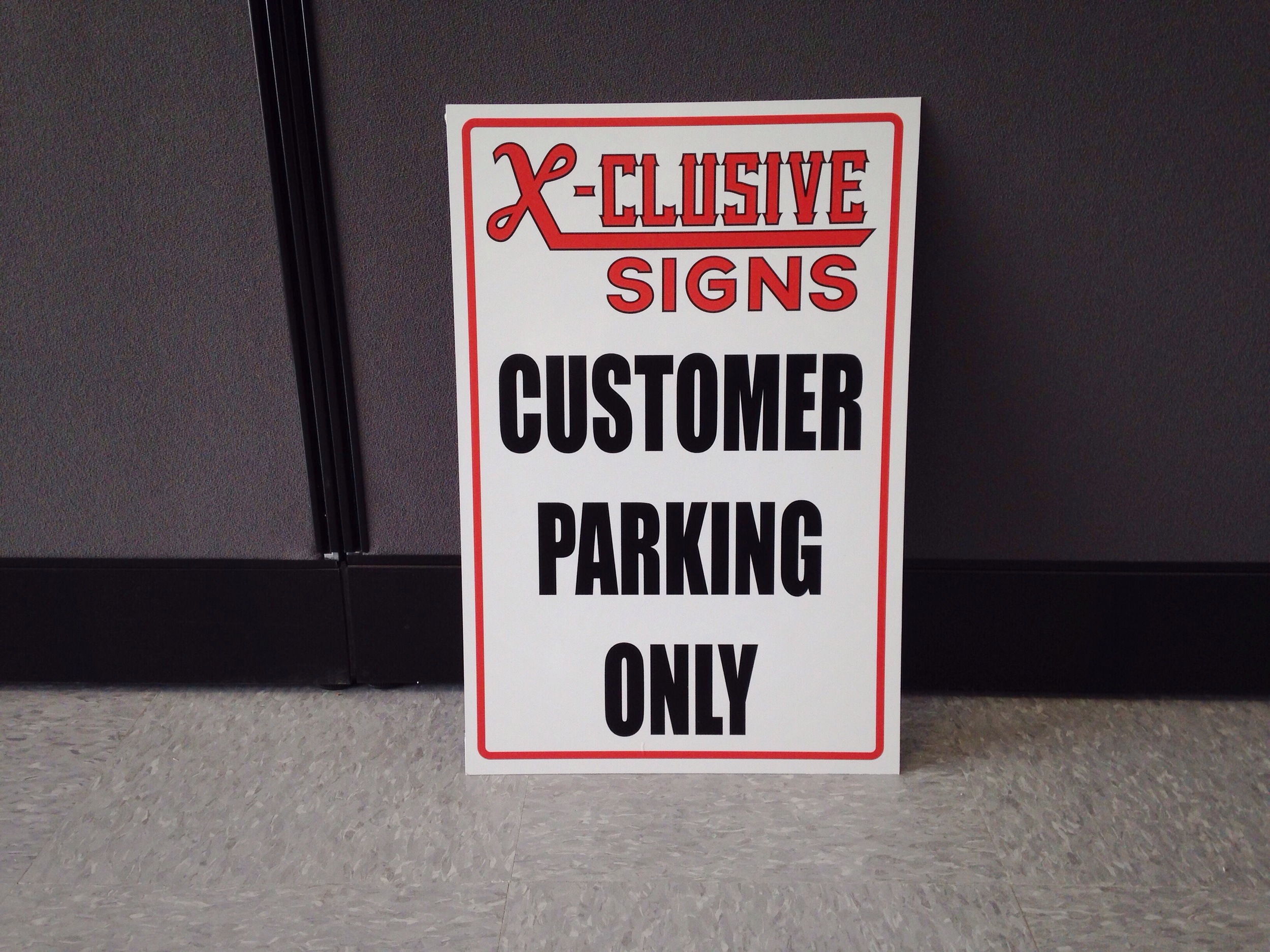 X-Clusive Parking Sign.JPG