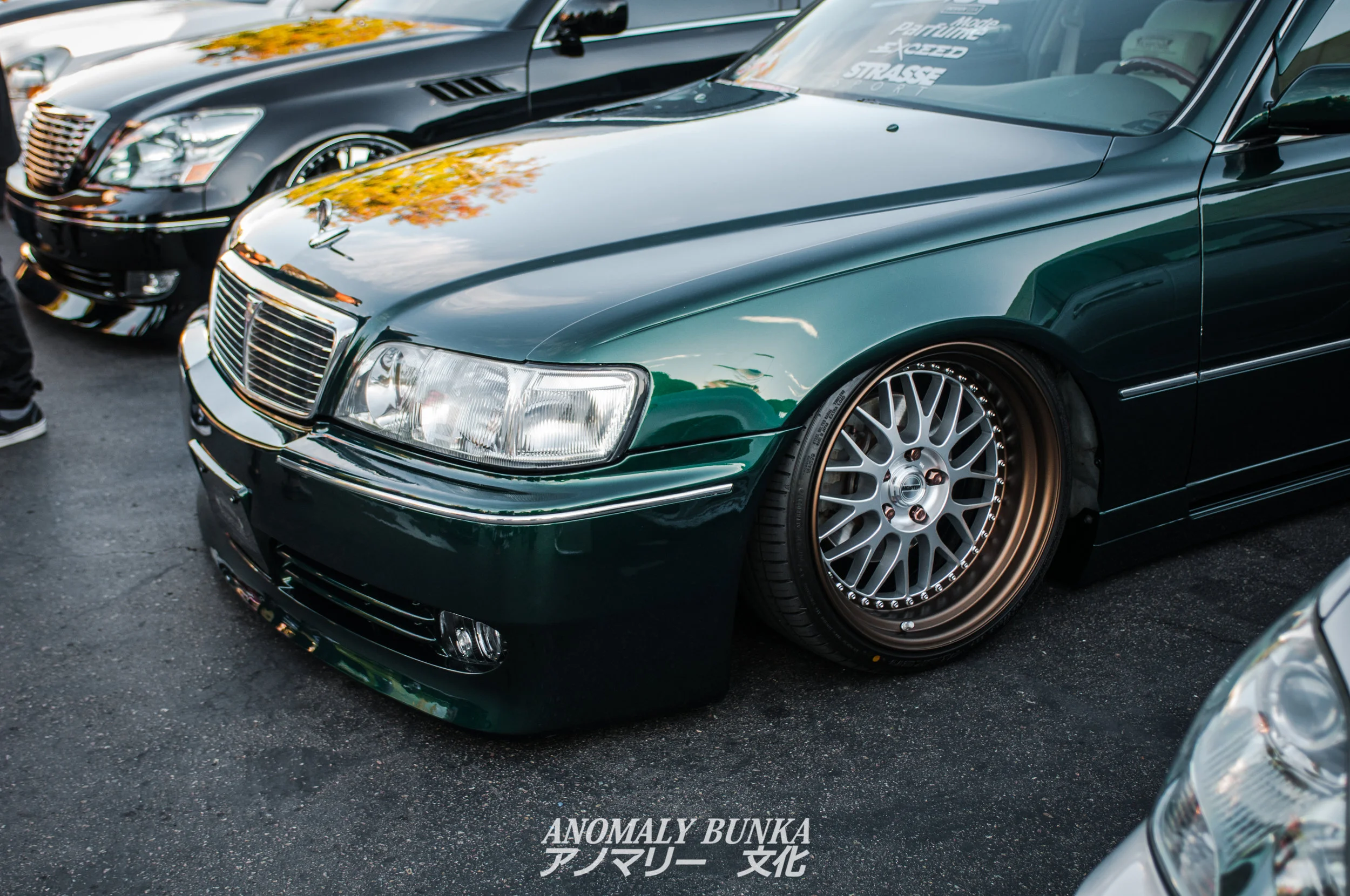 I love the color combo on his Work Meisters and how well it works with the new color of the car. I really like his overall build because it's so well put together. This is classic, VIP Styling.