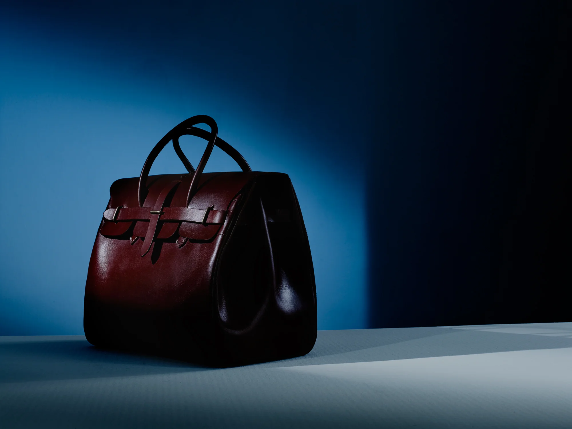 Origins Collection In his debut range James B. Young has drawn on his experience as a camel saddler and leather craftsman to create four unique designs. Each bag is hand produced by James in his Alice Springs workshop and is available in limited numbers. James draws on the heritage of Australian style defined by austerity of materials and pared back decoration. Born from necessity it invokes durability and purity. James B. Young's bags are true to this tradition and are contemporary classics in their own right.