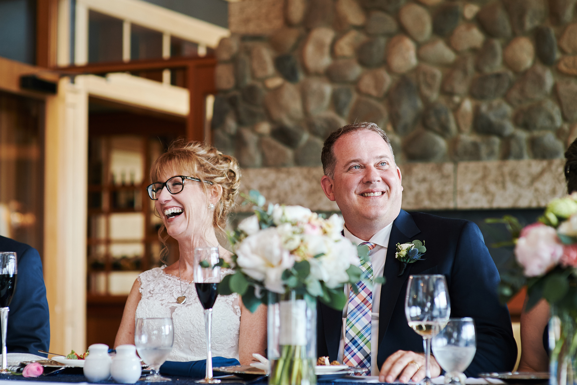 the bride and groom at the head table