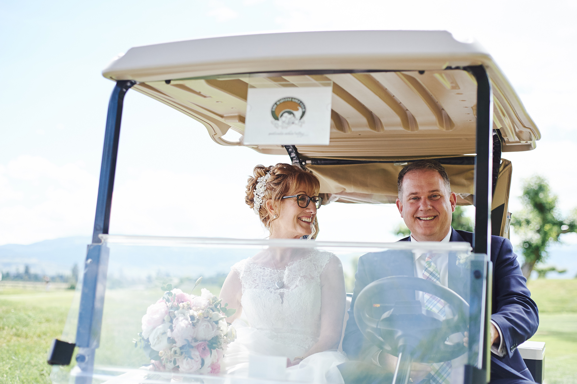 Married couple in their golf cart