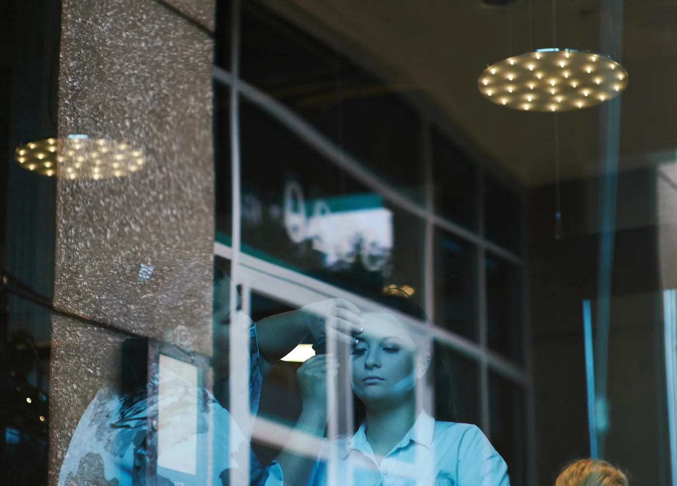 bride through window on wedding day