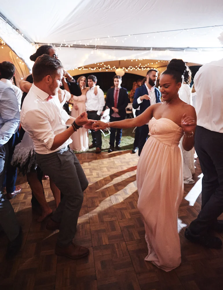 groom dancing at wedding reception