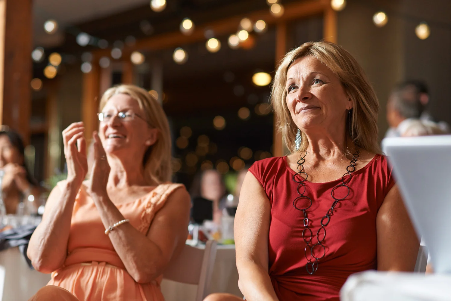 wedding guests listening to wedding speeches