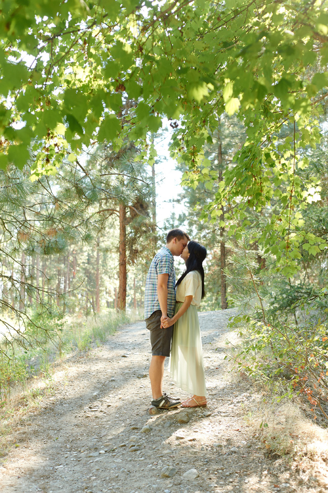 engaged-couple-on-a-sunny-path-in-mission-creek-park.jpg