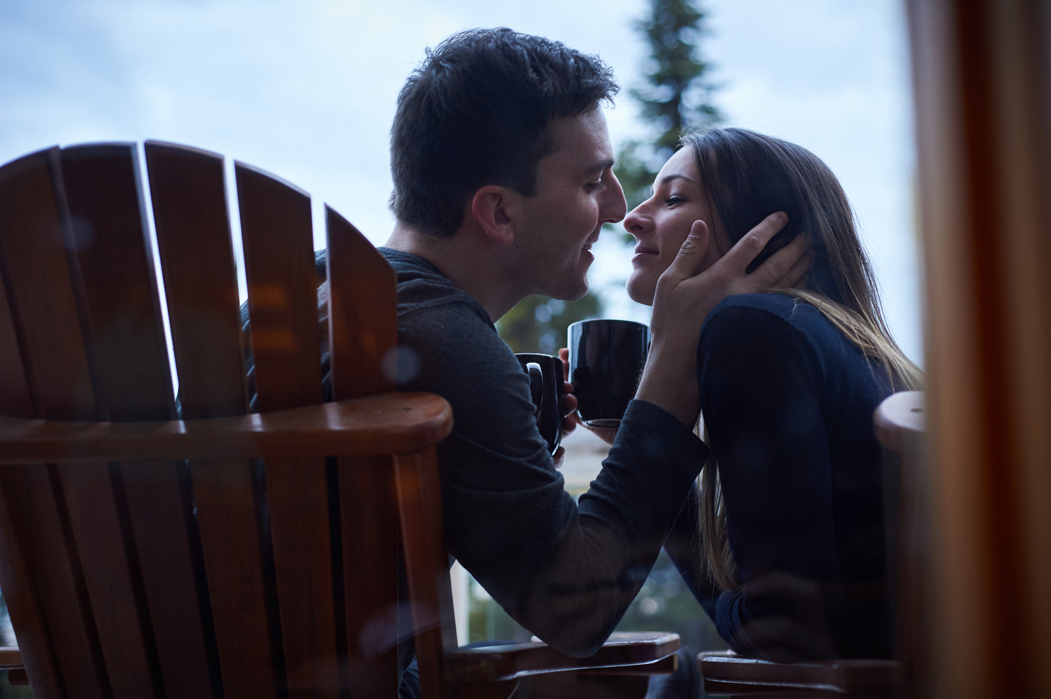engaged-couple-sipping-hot-chocolate-in-a-chalet-at-big-white.jpg