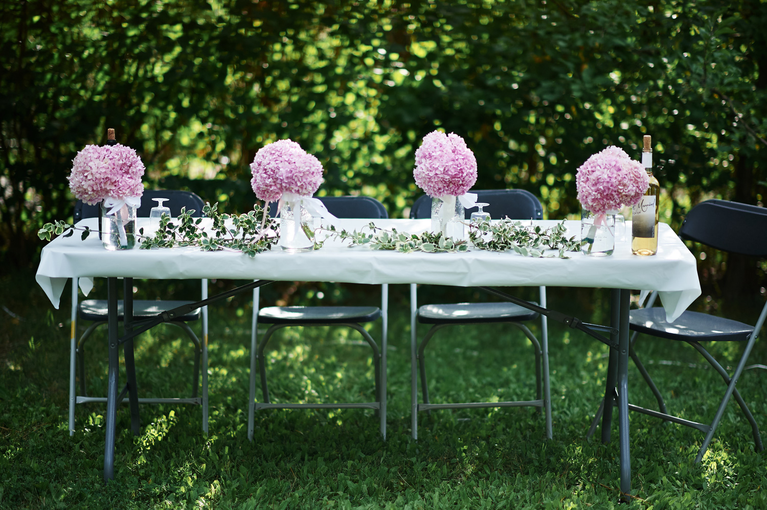 bridal-party-table-decorated-with-flowers.jpg