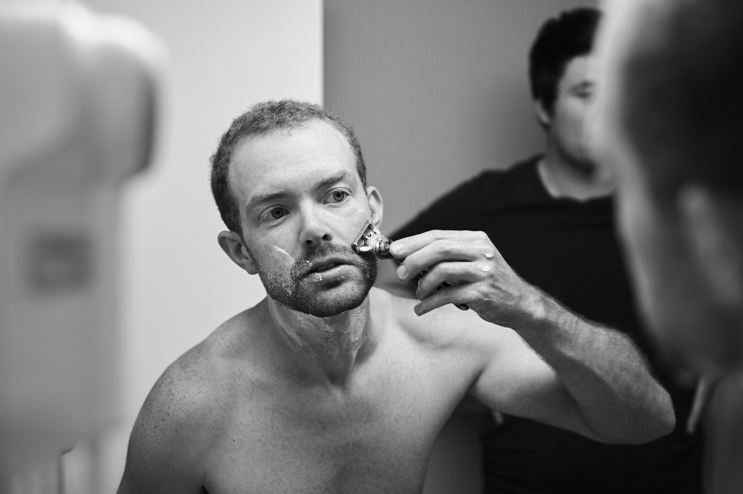 groom-shaving-and-getting-ready-black-and-white.jpg