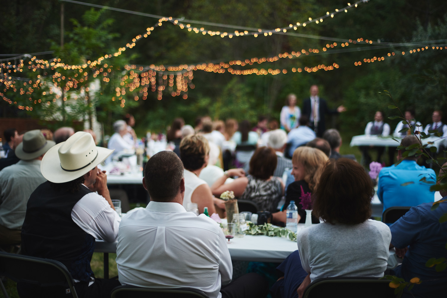 rustic-backyard-wedding-reception-with-lights.jpg
